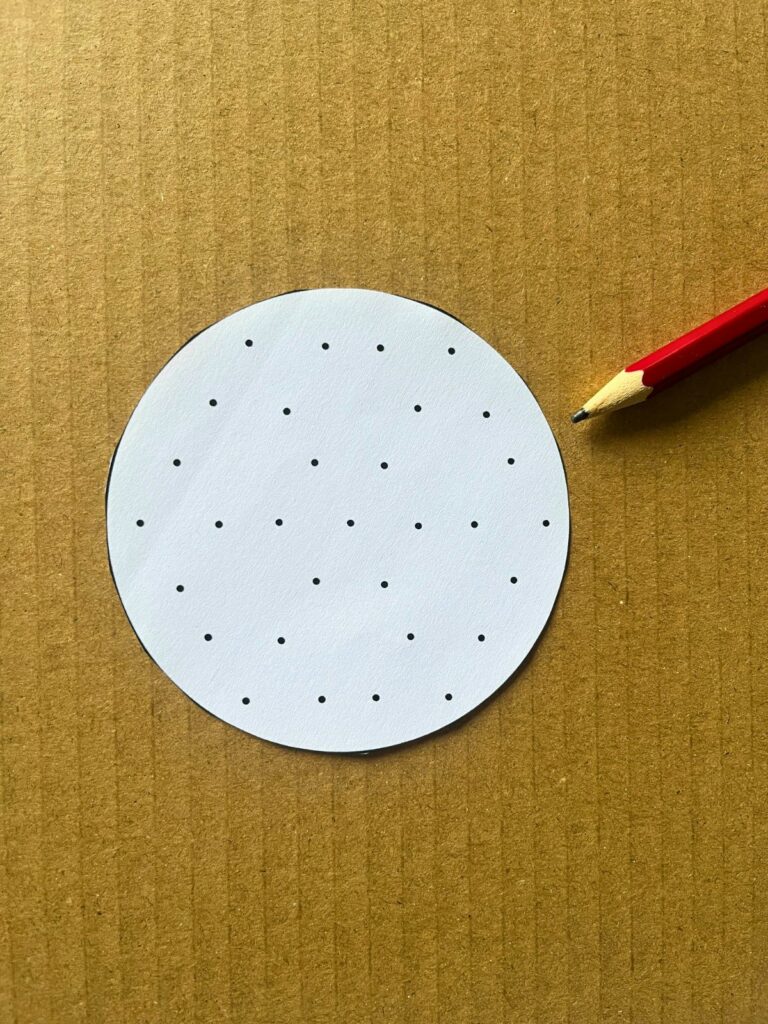 rondje sneeuwvlok knutselen uitknippen