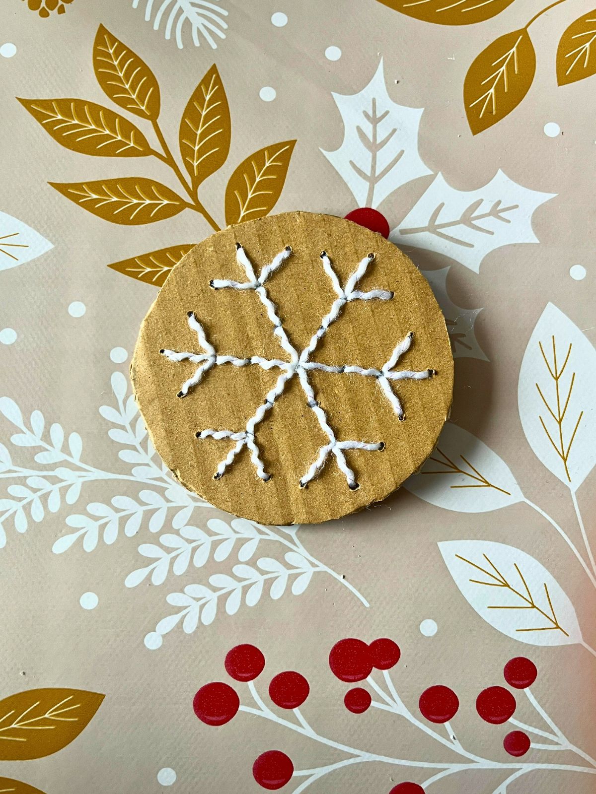 Sneeuwvlok borduren op karton